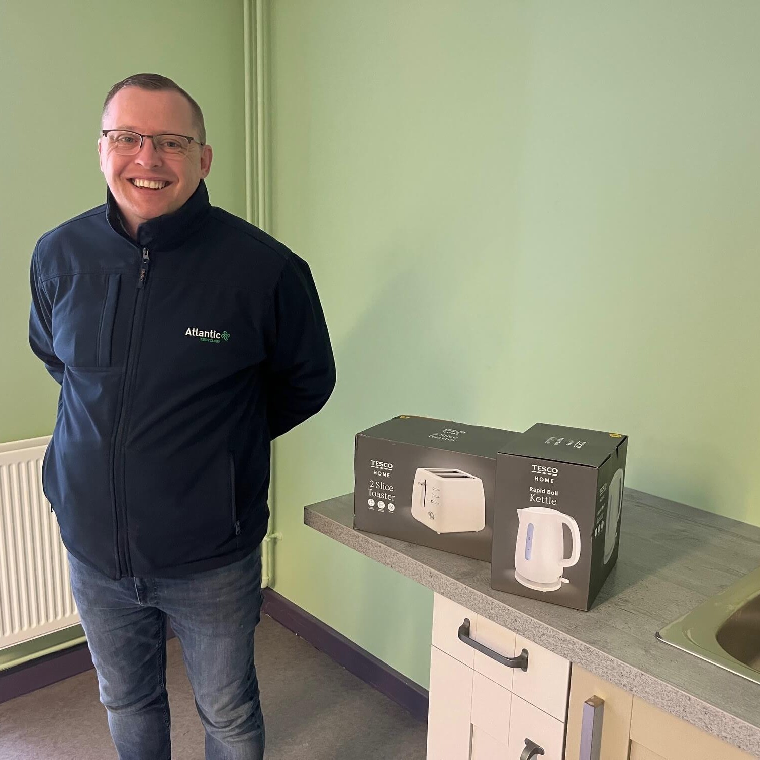 Darren Griffiths with toaster and kettle donation